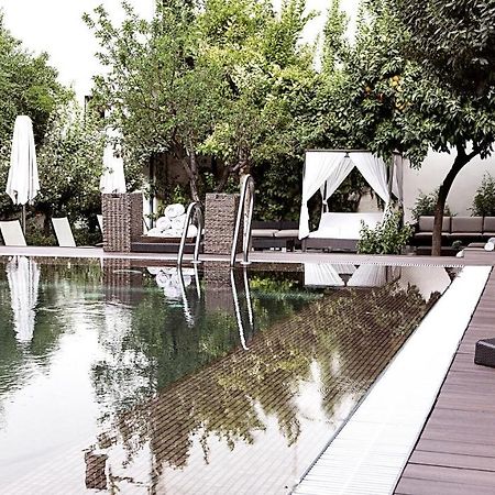 Hospes Palacio del Bailio Córdoba Exterior foto The pool at the hotel