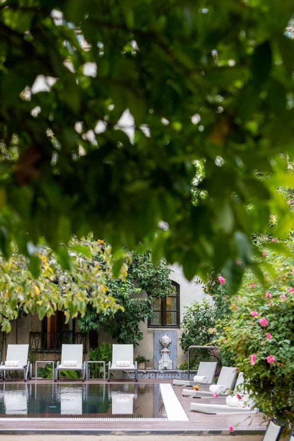 Hospes Palacio del Bailio Córdoba Exterior foto The garden of the house